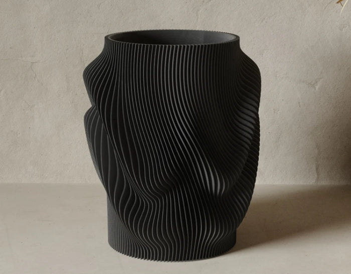 Terra Fold vase in Black, showing the deep twisted fold