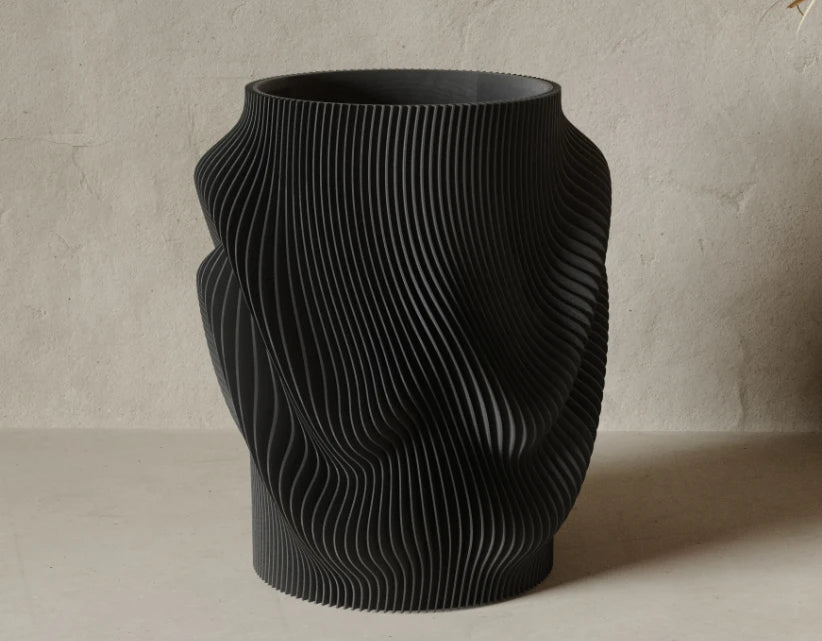 Terra Fold vase in Black, showing the deep twisted fold